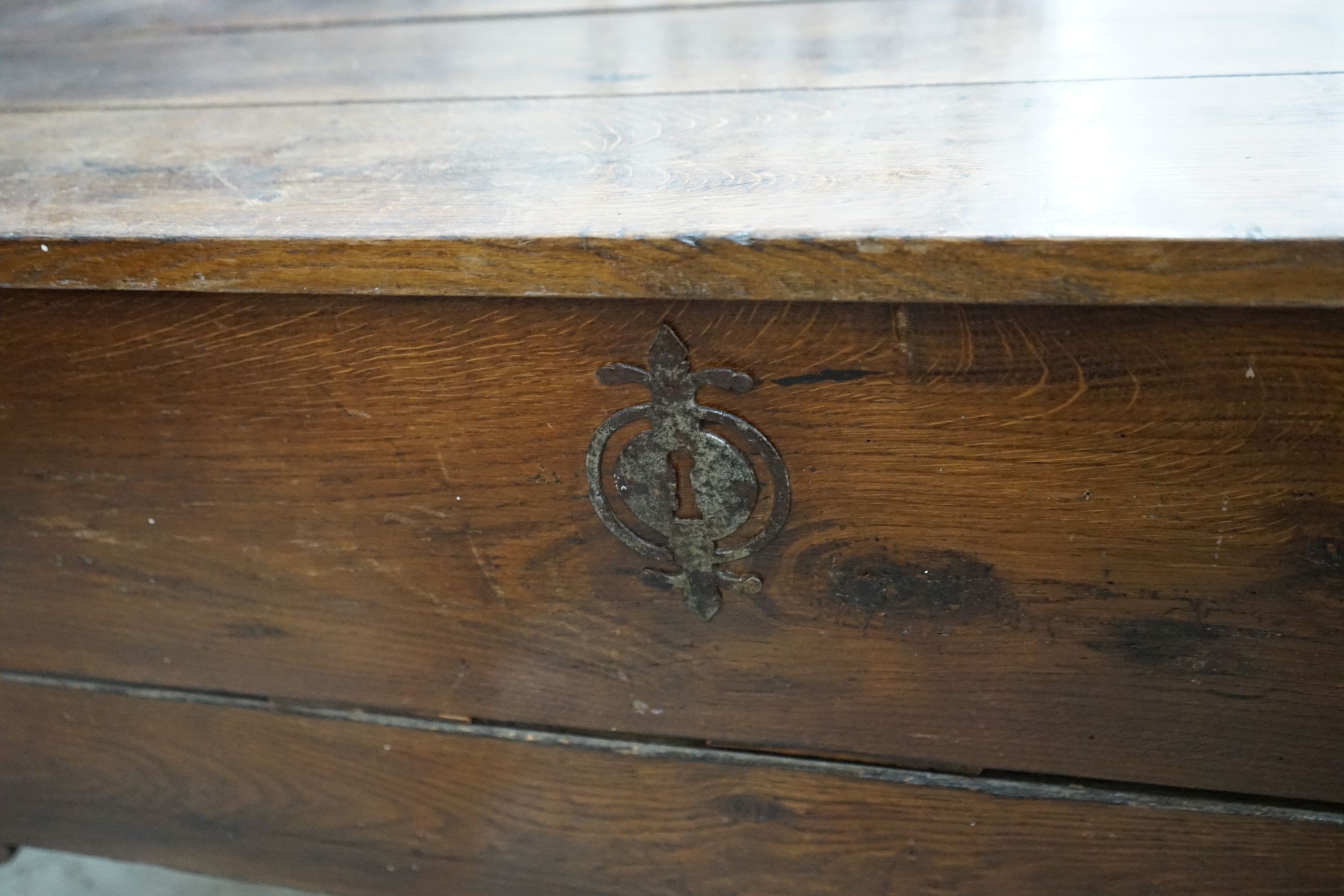 An early 19th century continental oak hinged top dough bin, width 145cm, depth 62cm, height 73cm